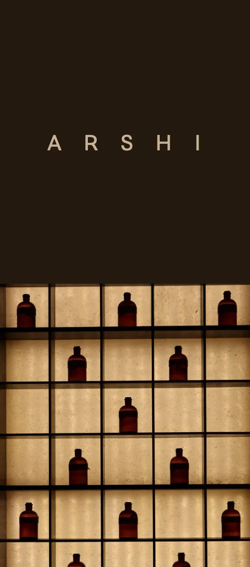 Arshi sake bottle display wall